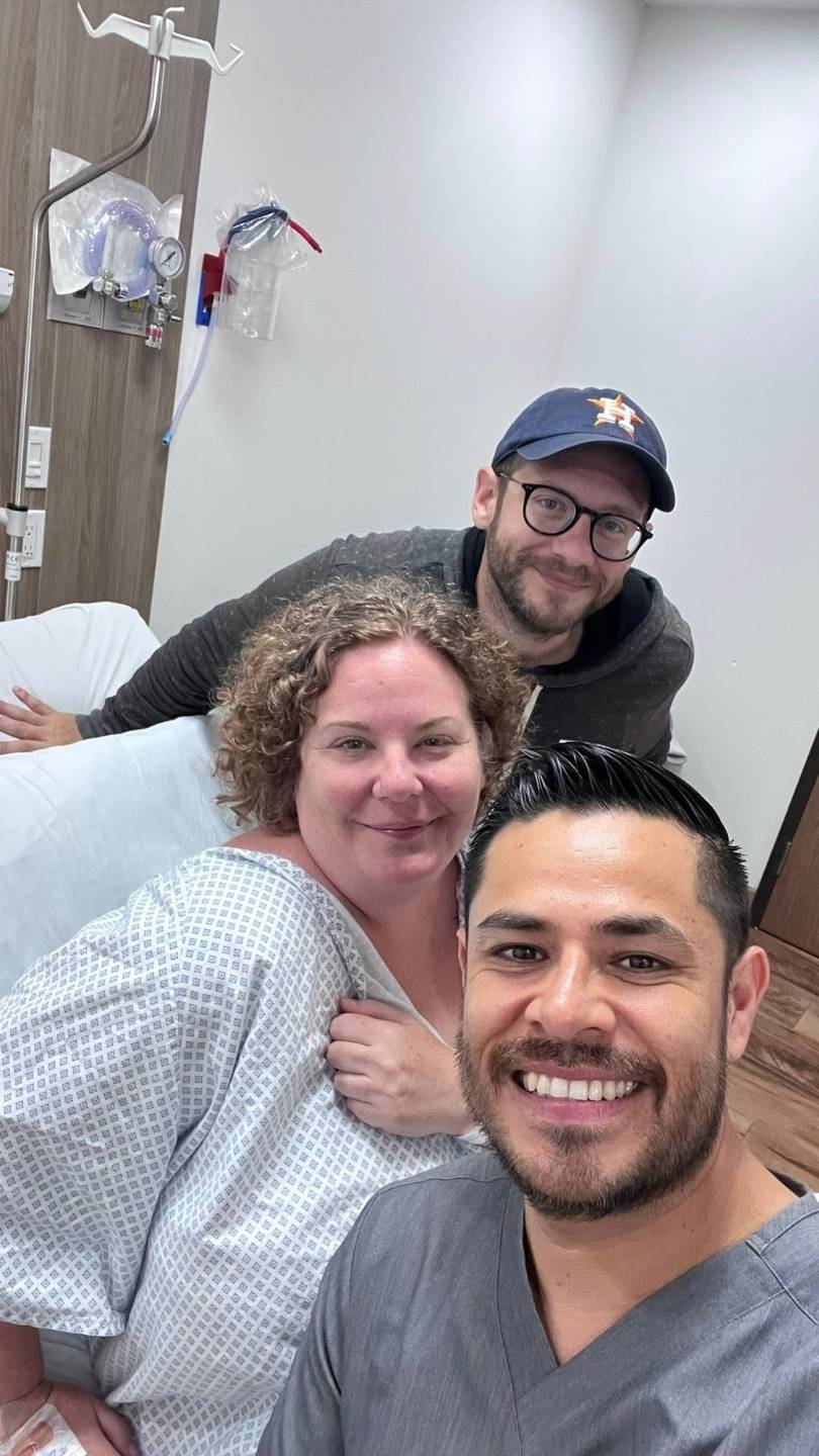 A warm moment between a patient and the medical staff before surgery