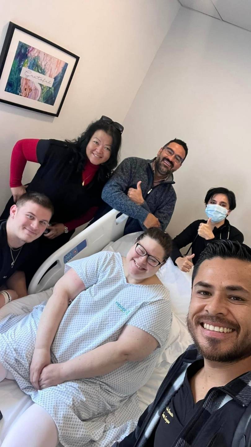 A patient with Dr. Luis Cervantes and the surgical team on the morning of surgery